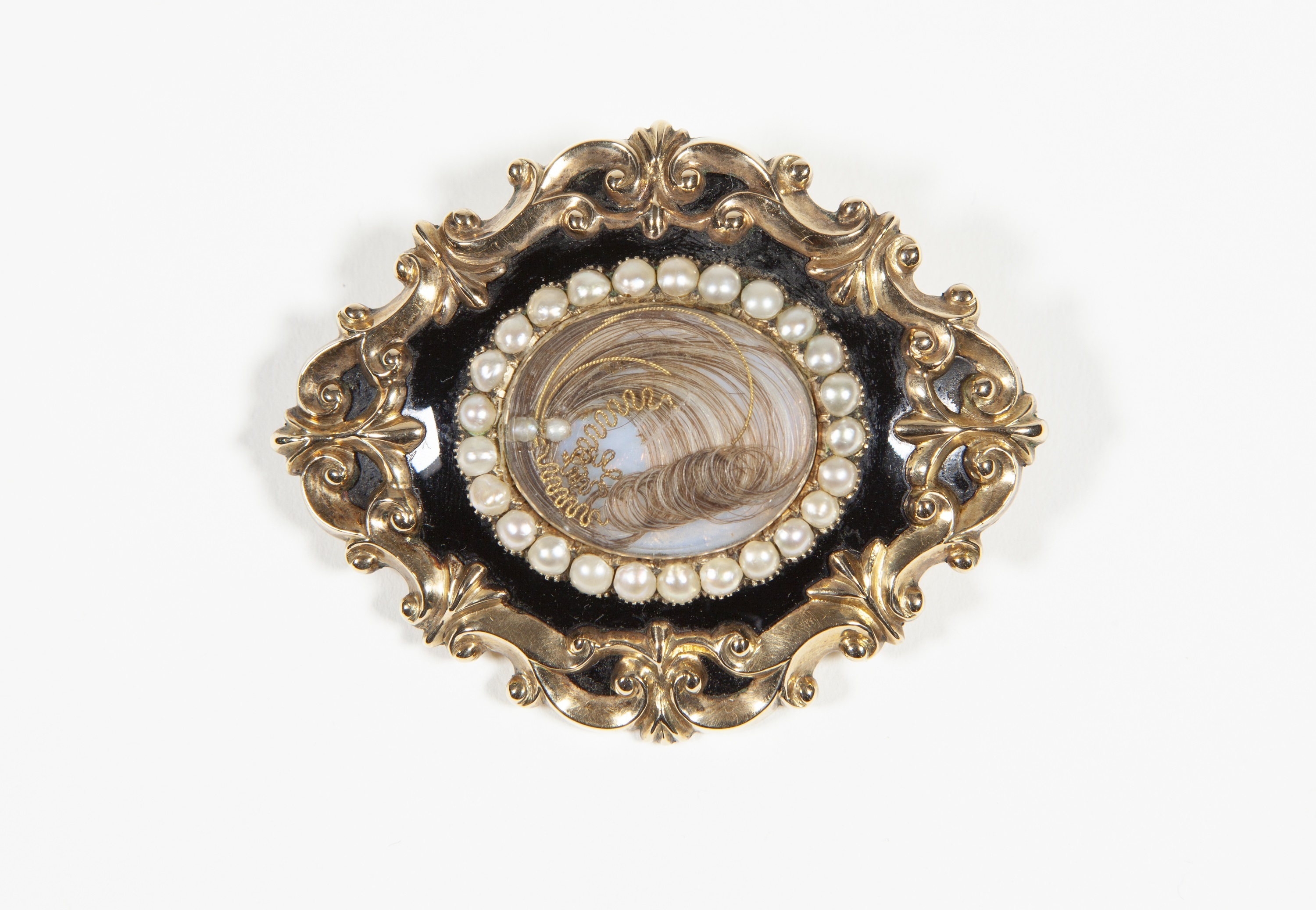 Mourning brooch owned by Emma Barker, featuring a lock of her mother's hair. Canterbury Museum 2020.72.2