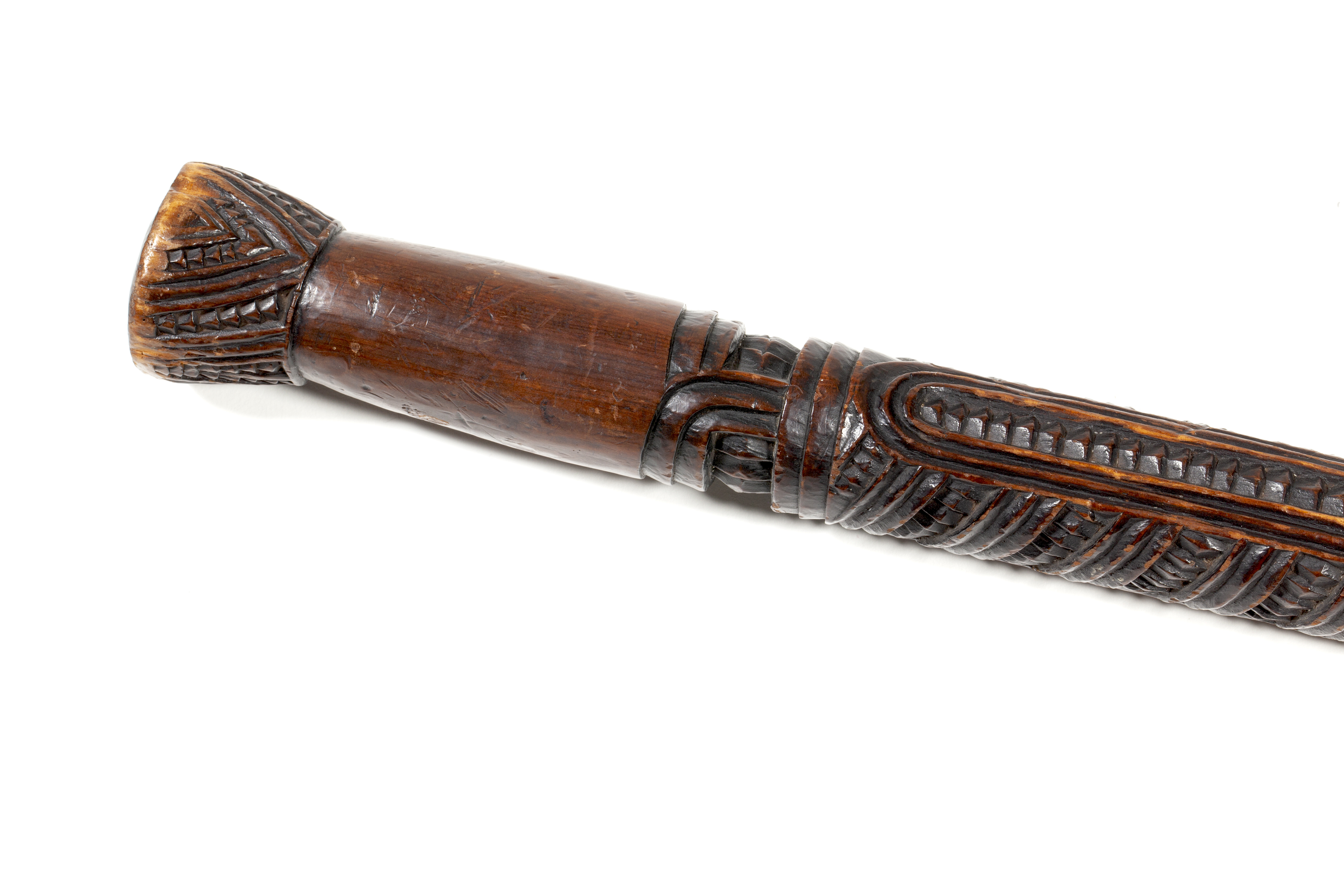 The head of the tokotoko, showing the finely carved rauponga which represent the ribs of ancestors. As it would be unusual to gift a taiaha to a woman, this tokotoko may be the “taiaha” gifted to Eliza Jones by Wiremu Tāmihana in 1858. Canterbury Museum 2020.90.1