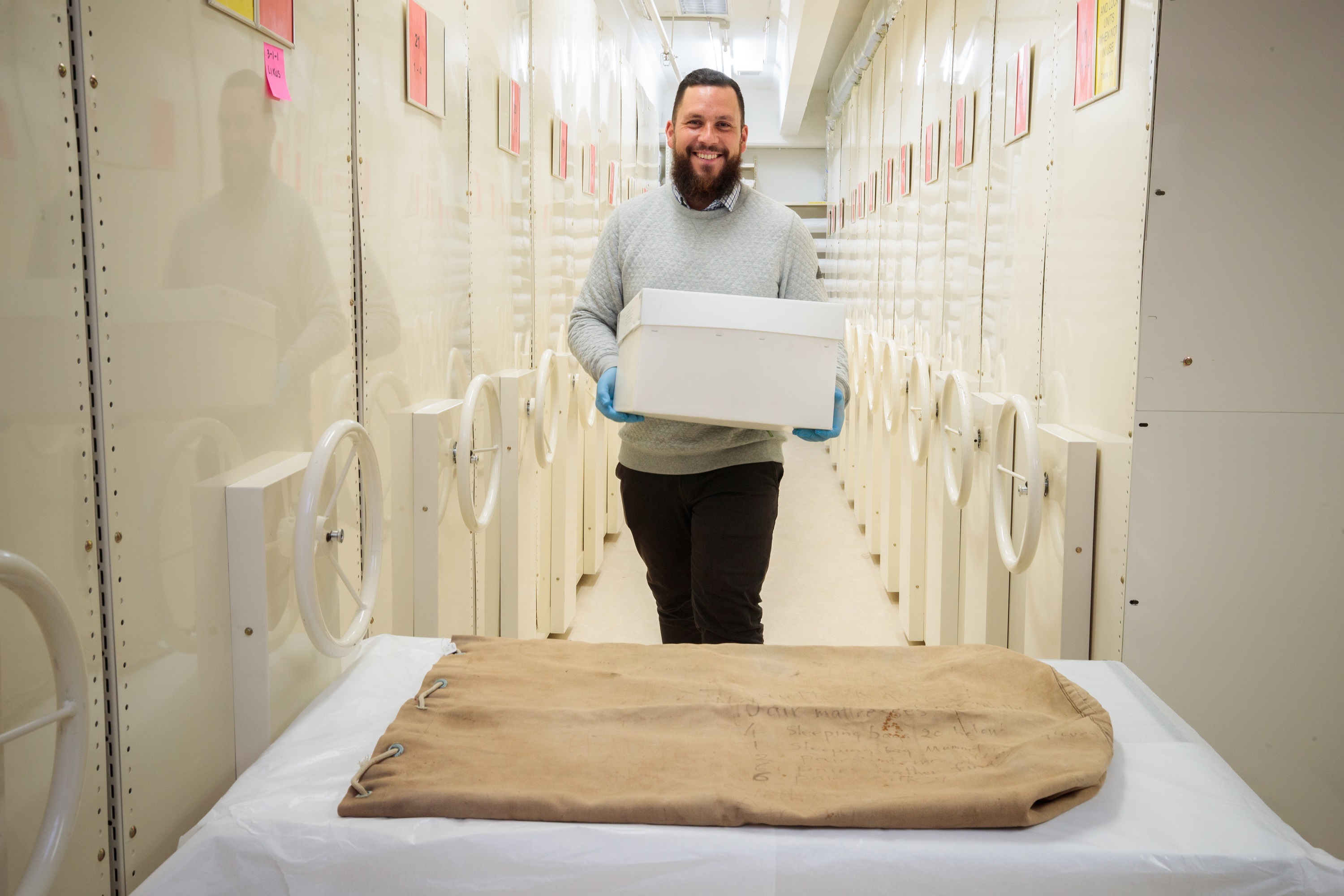 Curator Human History Corban Te Aika with the kit bag.