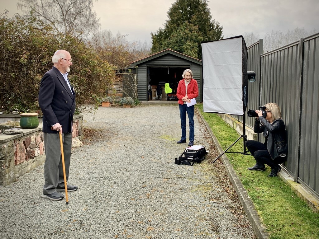 Denise Baynam at work photographing veteran William Bradley at his home in Geraldine. Image: All Rights Reserved