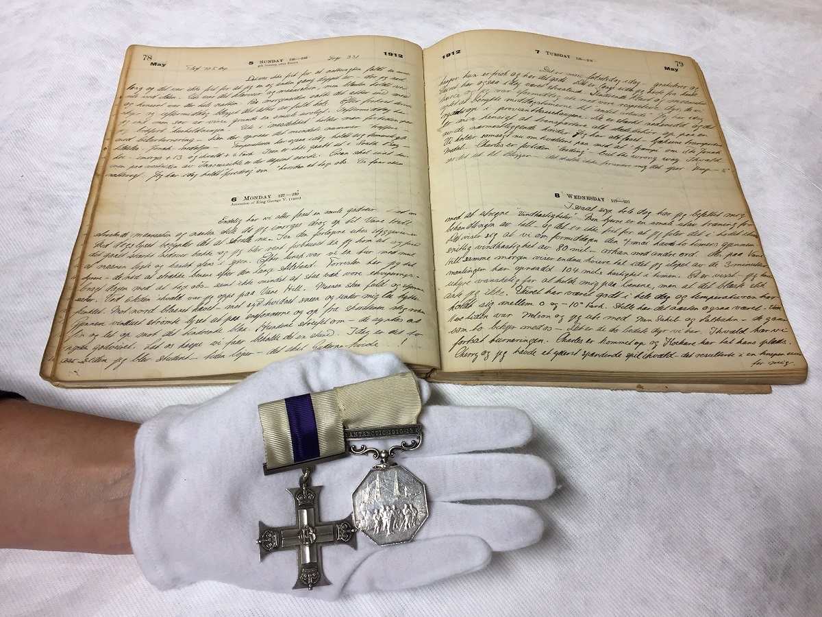 Gran’s Military Cross (left) and the Polar Medal with one of his diaries