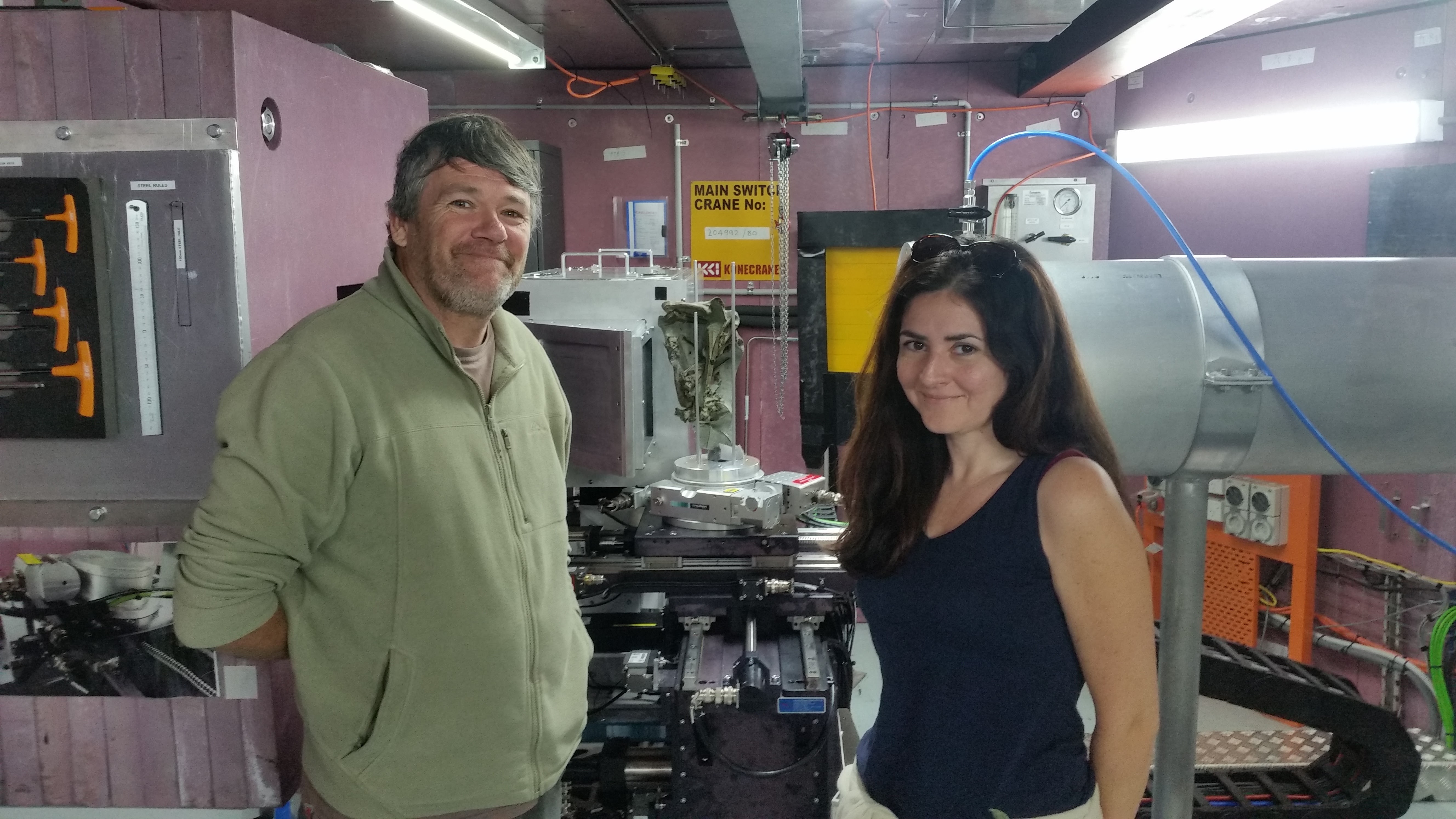 Drs Paul Scofield and Vanesa De Pietri in front of the DINGO instrument within the OPAL Reactor. A fossil penguin from North Canterbury is mounted in the beam path ready for imaging.