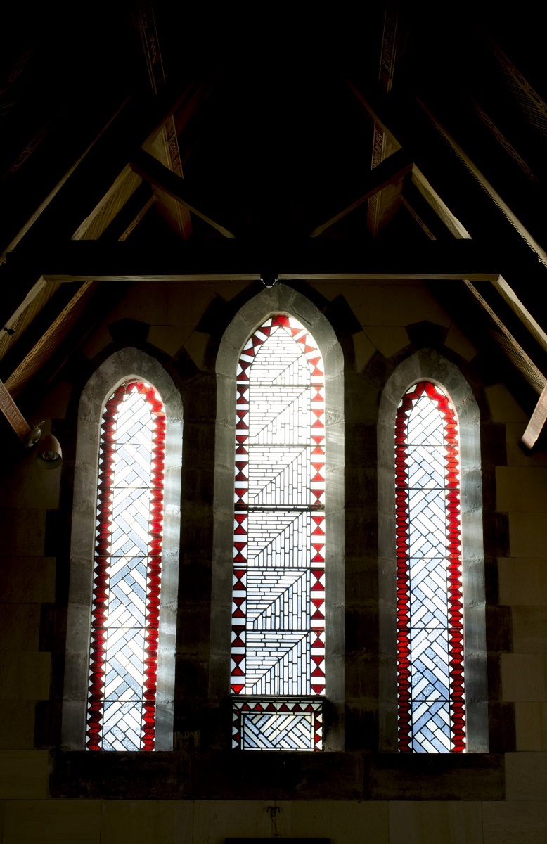One of the four sets of triple lancet windows at St Luke's that Menzies designed in response to tukutuku panels, used to decorate Māori buildings such as whare whakairo and whare karakia. Photograph by the author, 2016. All Rights Reserved